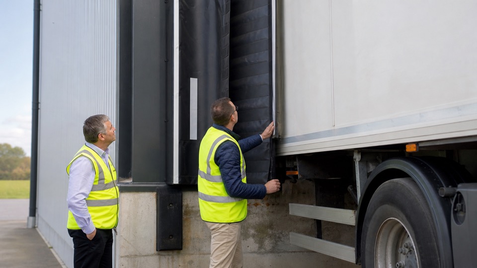 How dock shelters and seals affect safety, cost and performance - loading bay and industrial door support image
