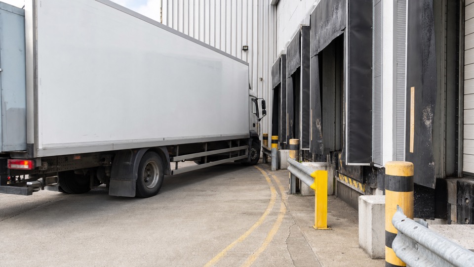 How site layout can increase loading bay damage - loading bay and industrial door support image